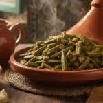 Traditional Moroccan okra recipe served in a rustic tagine pot
