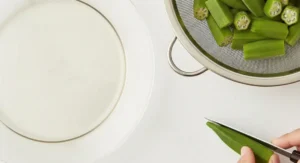 Slicing and seasoning okra for Moroccan okra recipe