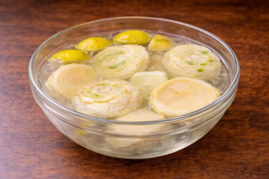 Cleaned artichokes soaking in lemon water for a Vegetarian Tagine Recipe